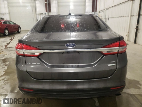 2018 Ford Fusion SE z VIN 3FA6P0HD6JR260522, wystawiony jako Copart lot #54382215 z przebiegiem 151 611 mil mil oraz Szkoda całkowita • Salvage title. Historia ofert i sprzedaży dostępna na DreamBid. Obrazek 6.