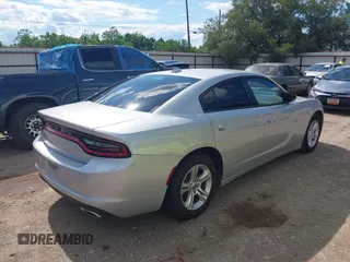 2023 Dodge Charger SXT with VIN 2C3CDXBG5PH529877, listed as a IAAI auction lot 42236262 with 45,887 mi miles and . Bid and sale history available at DreamBid. Image 4.