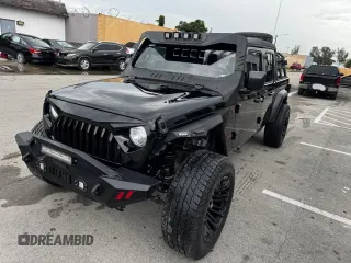2024 Jeep Gladiator Sport S with VIN 1C6HJTAG2RL132886, listed as a Copart auction lot 63946735 with 6,111 mi miles and Clean title. Bid and sale history available at DreamBid. Image 2.