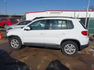 2016 Volkswagen Tiguan SE with VIN WVGBV7AX0GW018760, listed as a IAAI auction lot 41733586 with 60,743 mi miles and . Bid and sale history available at DreamBid. Image 15.