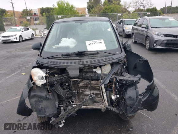 2012 Smart fortwo Pure z VIN WMEEJ3BA9CK521416, wystawiony jako IAAI lot #41847989 z przebiegiem Nie podano mil oraz . Historia ofert i sprzedaży dostępna na DreamBid. Obrazek 13.