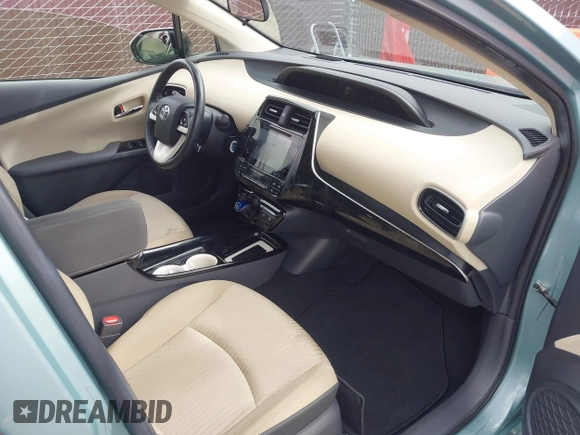 2016 Toyota Prius Four z VIN JTDKARFU8G3018145, wystawiony jako IAAI lot #42195308 z przebiegiem 87 649 mil mil oraz . Historia ofert i sprzedaży dostępna na DreamBid. Obrazek 5.