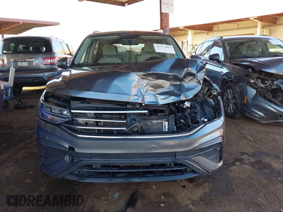 2022 Volkswagen Tiguan S with VIN 3VV1B7AX8NM146414, listed as a IAAI auction lot 41773162 with 115,193 mi miles and . Bid and sale history available at DreamBid. Image 12.