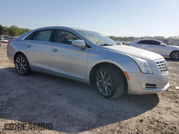 2013 Cadillac XTS Luxury with VIN 2G61P5S34D9100119, listed as a Copart auction lot 52525975 with 153,977 mi miles and Clean Title. Bid and sale history available at carsss.com. Image 4.