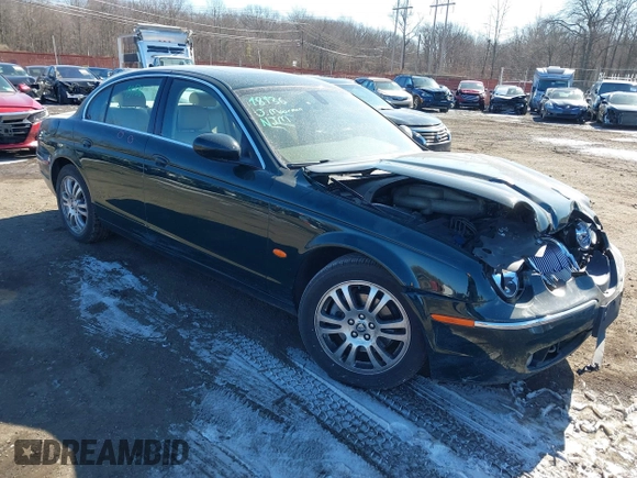 2005 Jaguar S-Type with VIN SAJWA01T95FN51551, listed as a IAAI auction lot 41637854 with 90,075 mi miles and . Bid and sale history available at DreamBid. Image 1.