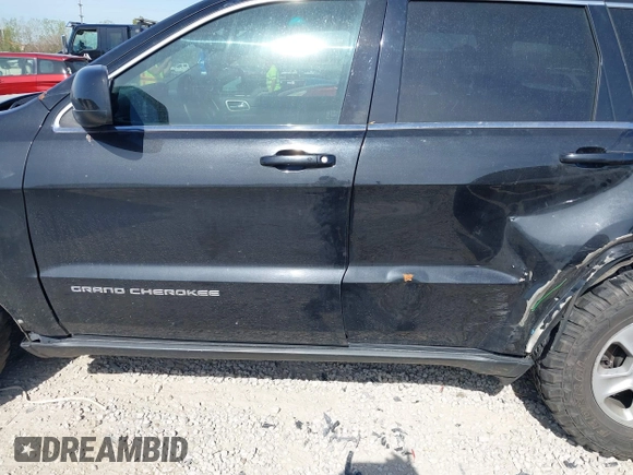 2014 Jeep Grand Cherokee Laredo with VIN 1C4RJEAG0EC442053, listed as a IAAI auction lot 42098601 with 200,982 mi miles and . Bid and sale history available at DreamBid. Image 14.