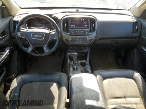 2016 GMC Canyon z VIN 1GTP6CE1XG1368688, wystawiony jako Copart lot #76475004 z przebiegiem 217 695 mil mil oraz Szkoda całkowita • Salvage title. Historia ofert i sprzedaży dostępna na DreamBid. Obrazek 8.