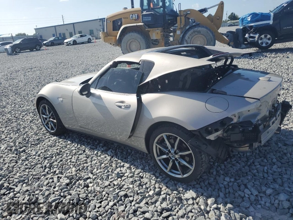 2023 Mazda MX-5 Miata Grand Touring z VIN JM1NDAM70P0551336, wystawiony jako Copart lot #54984385 z przebiegiem 10 948 mil mil oraz Szkoda całkowita • Salvage title. Historia ofert i sprzedaży dostępna na DreamBid. Obrazek 2.