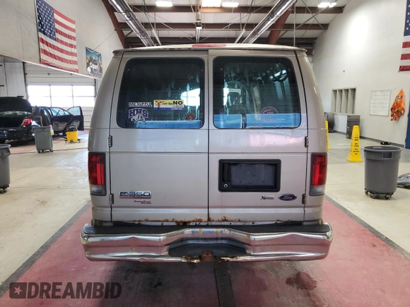 2013 Ford Econoline Cargo Commercial with VIN 1FTSS3EL5DDA33484, listed as a Copart auction lot 57722635 with 297,943 mi miles and Salvage title. Bid and sale history available at DreamBid. Image 6.