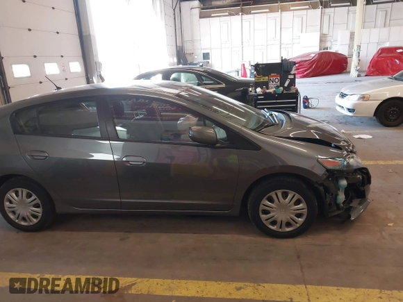 2010 Honda Insight LX with VIN JHMZE2H54AS040316, listed as a IAAI auction lot 41572246 with 142,850 mi miles and . Bid and sale history available at DreamBid. Image 13.