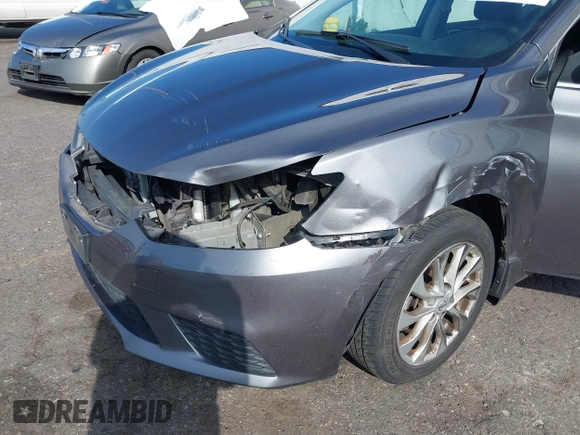 2017 Nissan Sentra S with VIN 3N1AB7AP5HY218409, listed as a IAAI auction lot 42015041 with 107,898 mi miles and . Bid and sale history available at DreamBid. Image 6.