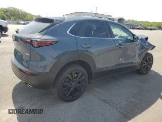 2024 Mazda CX-30 S Carbon Edition z VIN 3MVDMBCM1RM659830, wystawiony jako Copart lot #56556985 z przebiegiem 20 048 mil mil oraz Szkoda całkowita • Salvage title. Historia ofert i sprzedaży dostępna na DreamBid. Obrazek 3.