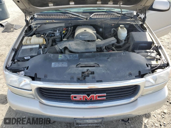2005 GMC Yukon XL SLT z VIN 1GKFK16Z25J170446, wystawiony jako Copart lot #60833165 z przebiegiem 255 497 mil mil oraz Czysty tytuł • Clean title. Historia ofert i sprzedaży dostępna na DreamBid. Obrazek 12.
