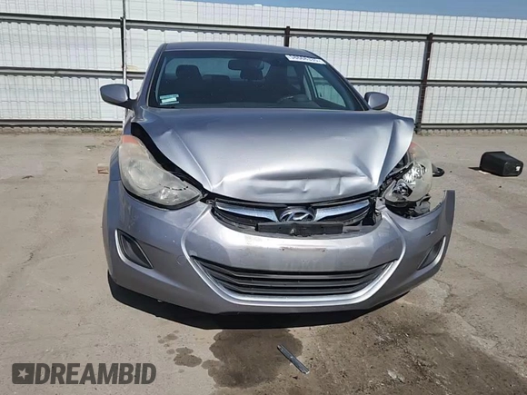 2013 Hyundai Elantra GLS z VIN KMHDH4AE3DU731009, wystawiony jako Copart lot #58668335 z przebiegiem 213 093 mil mil oraz Szkoda całkowita • Salvage title. Historia ofert i sprzedaży dostępna na DreamBid. Obrazek 13.