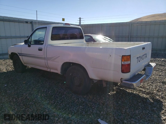 1994 Toyota Pickup DX z VIN JT4RN81P0R5200010, wystawiony jako Copart lot #89184805 z przebiegiem 123 270 mil mil oraz Szkoda całkowita • Salvage title. Historia ofert i sprzedaży dostępna na DreamBid. Obrazek 2.