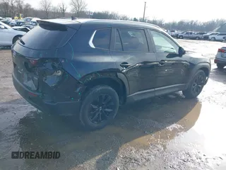 2024 Mazda CX-50 2.5 S Premium Package with VIN 7MMVABDM7RN186602, listed as a IAAI auction lot 41579987 with 10,692 mi miles. Bid and sale history available at carsss.com. Image 4.