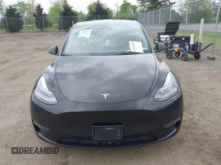 2023 Tesla Model Y Performance z VIN 7SAYGDEF7PF663387, wystawiony jako IAAI lot #42129258 z przebiegiem 42 691 mil mil oraz . Historia ofert i sprzedaży dostępna na DreamBid. Obrazek 13.