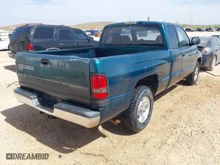 1999 Dodge Ram 1500 with VIN 3B7HC13Y0XG169104, listed as a IAAI auction lot 41936221 with 183,546 mi miles. Bid and sale history available at carsss.com. Image 4.