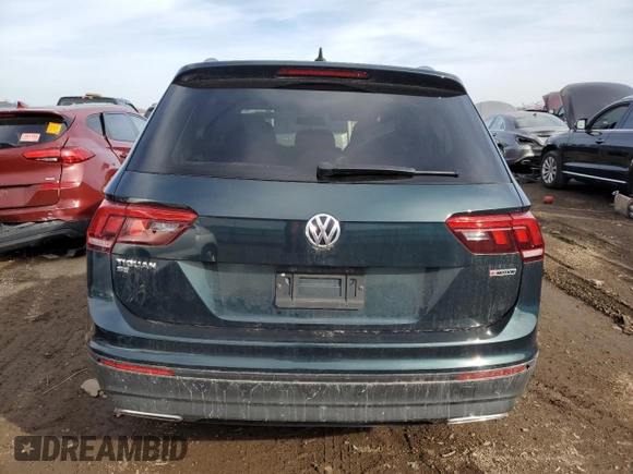 2019 Volkswagen Tiguan SE with VIN 3VV2B7AXXKM107923, listed as a Copart auction lot 49418395 with 106,833 mi miles and Salvage Title. Bid and sale history available at DreamBid. Image 6.