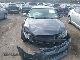 2015 Scion tC z VIN JTKJF5C70FJ013710, wystawiony jako IAAI lot #41770647 z przebiegiem Nie podano mil oraz . Historia ofert i sprzedaży dostępna na DreamBid. Obrazek 12.