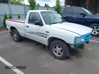 1995 Mazda B-Series Truck z VIN 4F4CR12A9STM30259, wystawiony jako IAAI lot #42243443 z przebiegiem 211 203 mil mil oraz . Historia ofert i sprzedaży dostępna na DreamBid. Obrazek 1.
