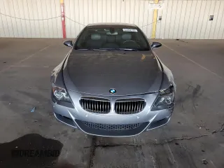 2006 BMW M6 with VIN WBSEH934X6B797428, listed as a Copart auction lot 63462135 with 73,393 mi miles and Salvage title. Bid and sale history available at DreamBid. Image 5.