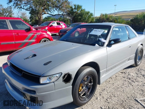 1992 Nissan 240SX z VIN JN1MS34P9NW100593, wystawiony jako IAAI lot #40867667 z przebiegiem Nie podano mil oraz . Historia ofert i sprzedaży dostępna na DreamBid. Obrazek 12.