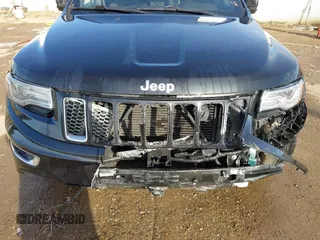2015 Jeep Grand Cherokee Summit with VIN 1C4RJFJMXFC878812, listed as a IAAI auction lot 41637279 with 149,488 mi miles. Bid and sale history available at carsss.com. Image 6.