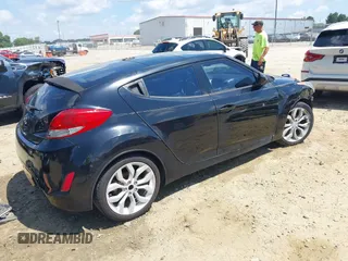 2012 Hyundai Veloster w/Black Int with VIN KMHTC6AD0CU056828, listed as a IAAI auction lot 42611623 with 136,242 mi miles and . Bid and sale history available at DreamBid. Image 4.