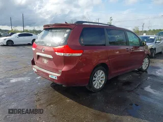 2013 Toyota Sienna XLE with VIN 5TDDK3DC0DS052412, listed as a IAAI auction lot 41850630 with Not Provided miles and . Bid and sale history available at DreamBid. Image 4.