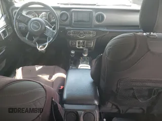 2020 Jeep Wrangler Unlimited Black and Tan with VIN 1C4HJXDGXLW221705, listed as a Copart auction lot 56224785 with 82,360 mi miles and Salvage title. Bid and sale history available at DreamBid. Image 8.