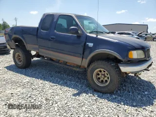2002 Ford F-150 XL with VIN 1FTRX18L82NB06824, listed as a Copart auction lot 57342315 with 207,390 mi miles and Salvage title. Bid and sale history available at DreamBid. Image 4.