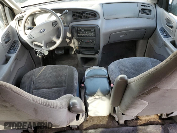 2001 Ford Windstar Cargo z VIN 2FTZA54471BB22773, wystawiony jako Copart lot #37283654 z przebiegiem 174 781 mil mil oraz Tytuł czysty. Historia ofert i sprzedaży dostępna na DreamBid. Obrazek 8.