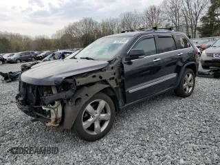 2013 Jeep Grand Cherokee Limited z VIN 1C4RJFBT2DC657126, wystawiony jako Copart lot #54321065 z przebiegiem 115 223 mil mil oraz Czysty tytuł • Clean title. Historia ofert i sprzedaży dostępna na DreamBid. Obrazek 1.