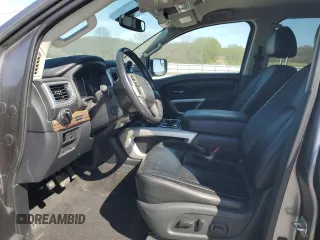 2018 Nissan Titan Pro-4X z VIN 1N6AA1E56JN505022, wystawiony jako Copart lot #50564285 z przebiegiem 249 986 mil mil oraz Szkoda całkowita • Salvage title. Historia ofert i sprzedaży dostępna na DreamBid. Obrazek 7.
