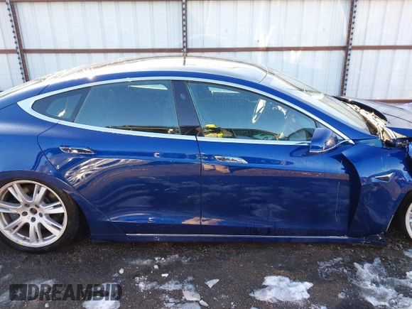 2020 Tesla Model S Long Range with VIN 5YJSA1E26LF410779, listed as a IAAI auction lot 41241192 with 68,764 mi miles and . Bid and sale history available at DreamBid. Image 14.