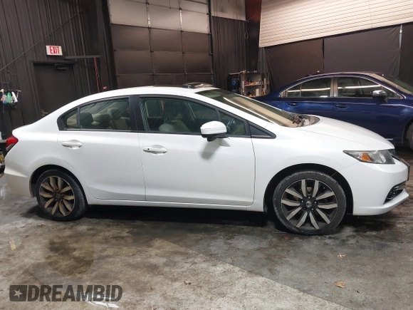 2014 Honda Civic EX-L with VIN 19XFB2F97EE261016, listed as a IAAI auction lot 41346617 with 124,539 mi miles and . Bid and sale history available at DreamBid. Image 13.