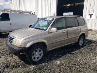 2001 Suzuki XL7 Standard z VIN JS3TX92V714115745, wystawiony jako Copart lot #71771504 z przebiegiem 157 190 mil mil oraz Szkoda całkowita • Salvage title. Historia ofert i sprzedaży dostępna na DreamBid. Obrazek 1.
