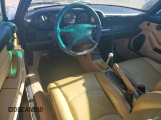 1996 Porsche 911 with VIN WP0DA2996TS385231, listed as a Copart auction lot 83699964 with 60,492 mi miles and Salvage title. Bid and sale history available at DreamBid. Image 8.