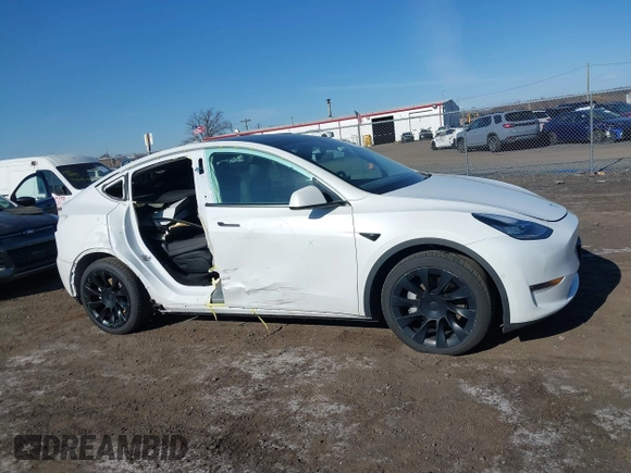 2022 Tesla Model Y Long Range with VIN 7SAYGAEE3NF337220, listed as a IAAI auction lot 41703912 with 46,319 mi miles and . Bid and sale history available at carsss.com. Image 13.