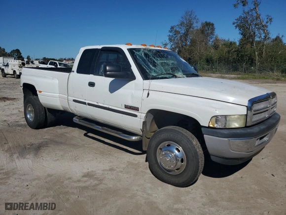 2002 Dodge Ram 3500 with VIN 3B7MF33C42M204856, listed as a Copart auction lot 75734824 with 109,735 mi miles and Salvage Title. Bid and sale history available at carsss.com. Image 4.