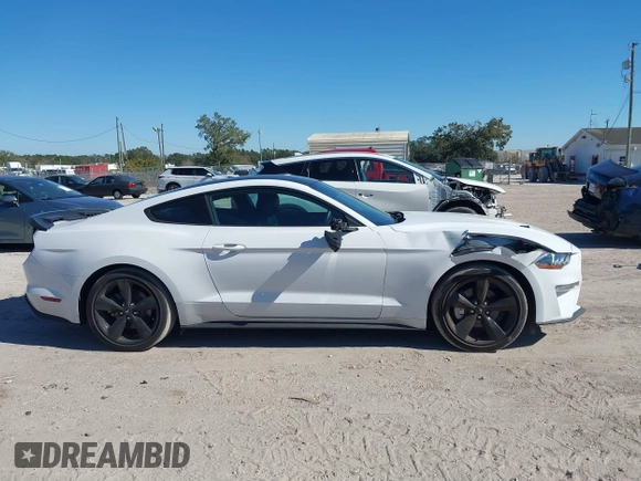 2022 Ford Mustang EcoBoost with VIN 1FA6P8TH5N5139871, listed as a IAAI auction lot 41290333 with 28,566 mi miles and . Bid and sale history available at DreamBid. Image 13.