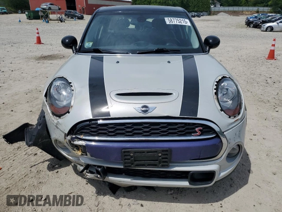 2015 MINI Hardtop 4 Door S with VIN WMWXU3C5XF2B56555, listed as a Copart auction lot 58775215 with 101,426 mi miles and Clean title. Bid and sale history available at DreamBid. Image 5.