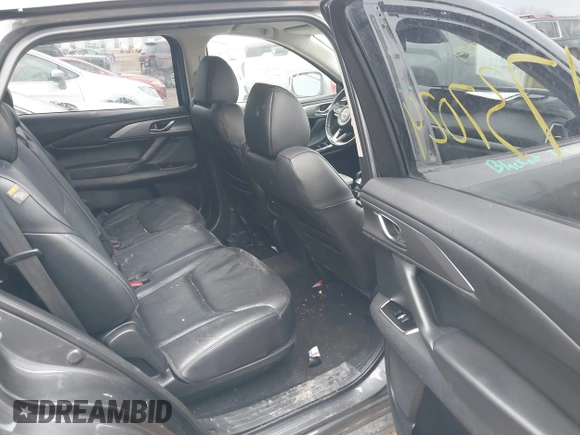 2018 Mazda CX-9 Touring with VIN JM3TCBCY3J0212479, listed as a IAAI auction lot 41737024 with 128,552 mi miles and . Bid and sale history available at DreamBid. Image 8.