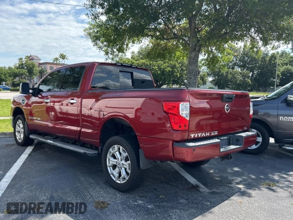 2016 Nissan Titan SL z VIN 1N6BA1F26GN512666, wystawiony jako Copart lot #59731495 z przebiegiem 120 182 mil mil oraz Czysty tytuł • Clean title. Historia ofert i sprzedaży dostępna na DreamBid. Obrazek 3.