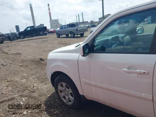 2011 Honda Pilot EX-L with VIN 5FNYF4H58BB085635, listed as a IAAI auction lot 42114205 with 218,399 mi miles. Bid and sale history available at carsss.com. Image 14.