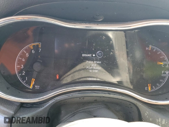 2014 Jeep Grand Cherokee Limited with VIN 1C4RJFBT6EC410774, listed as a Copart auction lot 58011005 with 166,506 mi miles and Salvage title. Bid and sale history available at DreamBid. Image 9.