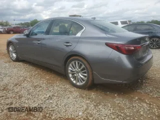 2019 Infiniti Q50 Luxe with VIN JN1EV7AP6KM517944, listed as a Copart auction lot 56942655 with 94,883 mi miles and Salvage title. Bid and sale history available at DreamBid. Image 2.