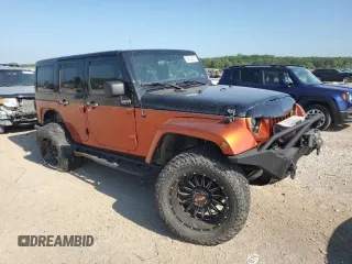 2012 Jeep Wrangler Unlimited Sport with VIN 1C4BJWDG0CL200802, listed as a Copart auction lot 63822365 with 116,501 mi miles and Salvage title. Bid and sale history available at DreamBid. Image 4.