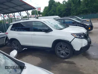 2021 Honda Passport EX-L with VIN 5FNYF8H54MB041738, listed as a IAAI auction lot 42310470 with 52,409 mi miles and . Bid and sale history available at DreamBid. Image 13.